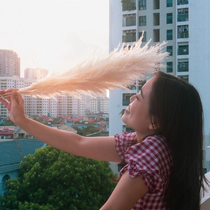 Portrait of Nova Ramires, group coordinator and fusion cooking expert